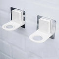 Pack of 2 Self Adhesive Shampoo Dispenser Bottle Racks, designed for bathroom, toilet, or kitchen; white plastic holders with circular openings, ideal for organizing bottles or cups on tiled walls.